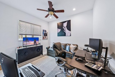 Beautifully renovated and filled with natural light, this bright on Ibis Golf and Country Club in Florida - for sale on GolfHomes.com, golf home, golf lot