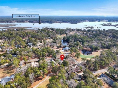 Charming brick home located in the gated community of Lockwood on Lockwood Folly Country Club in North Carolina - for sale on GolfHomes.com, golf home, golf lot
