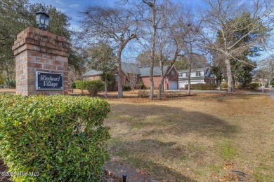 Charming brick home located in the gated community of Lockwood on Lockwood Folly Country Club in North Carolina - for sale on GolfHomes.com, golf home, golf lot