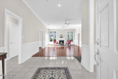 Charming brick home located in the gated community of Lockwood on Lockwood Folly Country Club in North Carolina - for sale on GolfHomes.com, golf home, golf lot