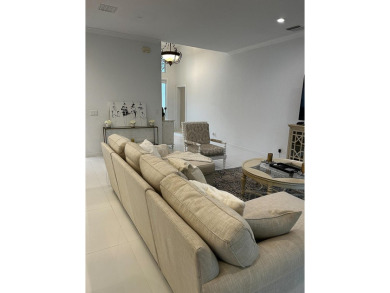 Beautifully renovated and filled with natural light, this bright on Ibis Golf and Country Club in Florida - for sale on GolfHomes.com, golf home, golf lot