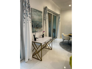 Beautifully renovated and filled with natural light, this bright on Ibis Golf and Country Club in Florida - for sale on GolfHomes.com, golf home, golf lot