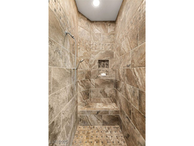 INCREDIBLE SINGLE STORY SECURED BEHIND DOUBLE GATES IN SOUTHERN on Southern Highlands Golf Club in Nevada - for sale on GolfHomes.com, golf home, golf lot