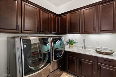 INCREDIBLE SINGLE STORY SECURED BEHIND DOUBLE GATES IN SOUTHERN on Southern Highlands Golf Club in Nevada - for sale on GolfHomes.com, golf home, golf lot