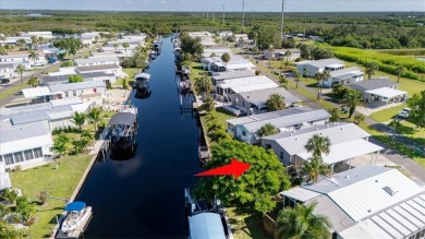 WATERFRONT LIVING AT ITS BEST - LAND OWNERSHIP! NO LOT RENT! on Live Oak Golf Club and RV Park in Florida - for sale on GolfHomes.com, golf home, golf lot