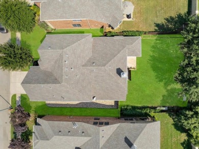 This beautifully designed four-bedroom, two-and-a-half bathroom on Texas Star Golf Course in Texas - for sale on GolfHomes.com, golf home, golf lot