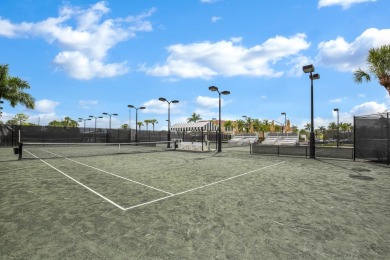 Beautifully renovated and filled with natural light, this bright on Ibis Golf and Country Club in Florida - for sale on GolfHomes.com, golf home, golf lot