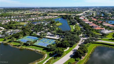Welcome to this beautifully maintained lakefront home offering on Royal Tee Country Club in Florida - for sale on GolfHomes.com, golf home, golf lot