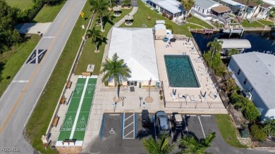 WATERFRONT LIVING AT ITS BEST - LAND OWNERSHIP! NO LOT RENT! on Live Oak Golf Club and RV Park in Florida - for sale on GolfHomes.com, golf home, golf lot