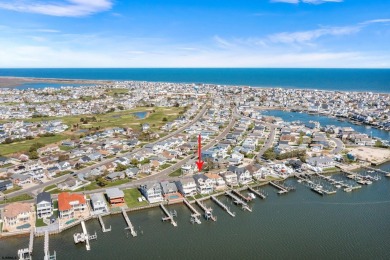 Welcome to your BAYFRONT sanctuary where luxury combines with on The Links At Brigantine Beach in New Jersey - for sale on GolfHomes.com, golf home, golf lot