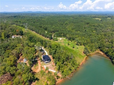 Swim, kayak and beach your boat from your very own waterfront on Keowee Key Golf and Country Club in South Carolina - for sale on GolfHomes.com, golf home, golf lot