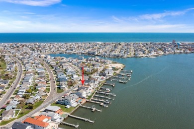 Welcome to your BAYFRONT sanctuary where luxury combines with on The Links At Brigantine Beach in New Jersey - for sale on GolfHomes.com, golf home, golf lot