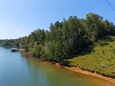Swim, kayak and beach your boat from your very own waterfront on Keowee Key Golf and Country Club in South Carolina - for sale on GolfHomes.com, golf home, golf lot