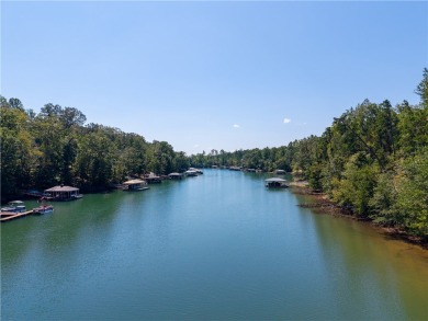Swim, kayak and beach your boat from your very own waterfront on Keowee Key Golf and Country Club in South Carolina - for sale on GolfHomes.com, golf home, golf lot