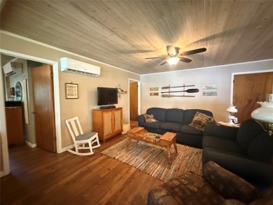 Wonderful lake front home in the piney woods of East Texas on Pine Dunes Golf Course in Texas - for sale on GolfHomes.com, golf home, golf lot
