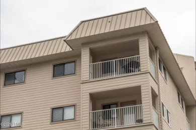 Uncover paradise in this stunning top-floor end unit on Hilton on Palmetto Dunes Golf Course and Resort in South Carolina - for sale on GolfHomes.com, golf home, golf lot