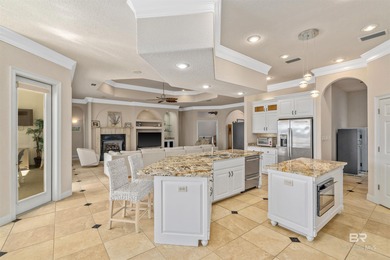 Heated pool with dual fountains. Golf course views with coastal on Craft Farms - Cypress Bend in Alabama - for sale on GolfHomes.com, golf home, golf lot