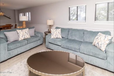Uncover paradise in this stunning top-floor end unit on Hilton on Palmetto Dunes Golf Course and Resort in South Carolina - for sale on GolfHomes.com, golf home, golf lot