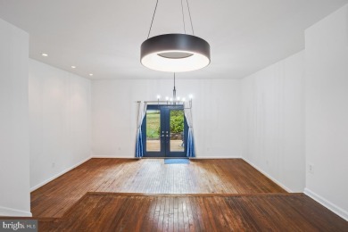Welcome home to this beautifully renovated townhouse at 2134 on Reston National Golf Course in Virginia - for sale on GolfHomes.com, golf home, golf lot