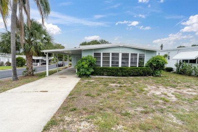 Spacious  Inviting Corner Lot Home in Palm Hill Country Club - on Palm Hill Golf Club in Florida - for sale on GolfHomes.com, golf home, golf lot