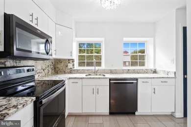 Welcome home to this beautifully renovated townhouse at 2134 on Reston National Golf Course in Virginia - for sale on GolfHomes.com, golf home, golf lot