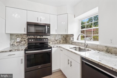 Welcome home to this beautifully renovated townhouse at 2134 on Reston National Golf Course in Virginia - for sale on GolfHomes.com, golf home, golf lot
