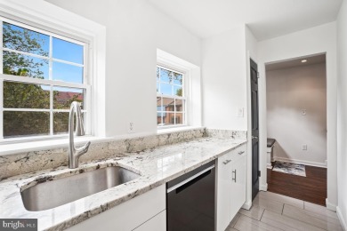 Welcome home to this beautifully renovated townhouse at 2134 on Reston National Golf Course in Virginia - for sale on GolfHomes.com, golf home, golf lot
