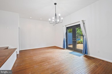 Welcome home to this beautifully renovated townhouse at 2134 on Reston National Golf Course in Virginia - for sale on GolfHomes.com, golf home, golf lot