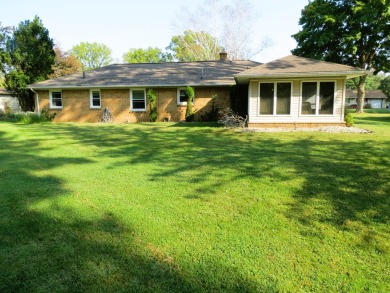 Terrific brick ranch in fantastic location! Private back yard; on Cascades Golf Course in Michigan - for sale on GolfHomes.com, golf home, golf lot