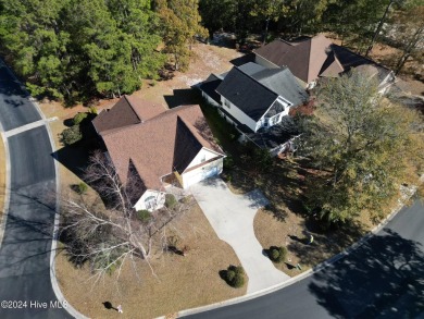 It's time to experience the highly attractive, custom home on Carolina National Golf Club in North Carolina - for sale on GolfHomes.com, golf home, golf lot