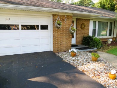 Terrific brick ranch in fantastic location! Private back yard; on Cascades Golf Course in Michigan - for sale on GolfHomes.com, golf home, golf lot