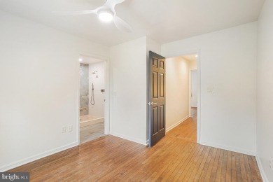 Welcome home to this beautifully renovated townhouse at 2134 on Reston National Golf Course in Virginia - for sale on GolfHomes.com, golf home, golf lot