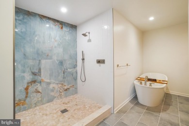 Welcome home to this beautifully renovated townhouse at 2134 on Reston National Golf Course in Virginia - for sale on GolfHomes.com, golf home, golf lot