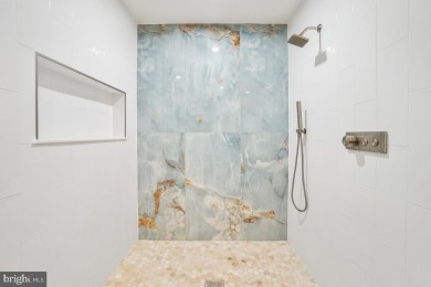Welcome home to this beautifully renovated townhouse at 2134 on Reston National Golf Course in Virginia - for sale on GolfHomes.com, golf home, golf lot