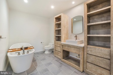 Welcome home to this beautifully renovated townhouse at 2134 on Reston National Golf Course in Virginia - for sale on GolfHomes.com, golf home, golf lot
