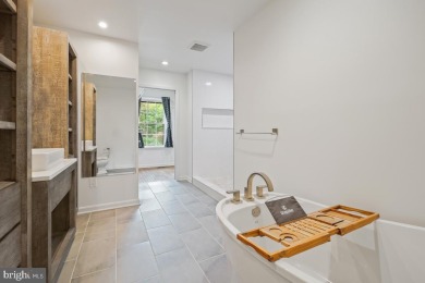 Welcome home to this beautifully renovated townhouse at 2134 on Reston National Golf Course in Virginia - for sale on GolfHomes.com, golf home, golf lot