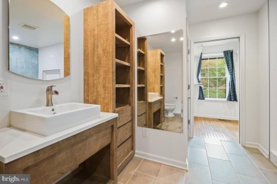 Welcome home to this beautifully renovated townhouse at 2134 on Reston National Golf Course in Virginia - for sale on GolfHomes.com, golf home, golf lot