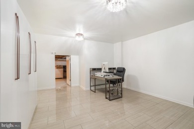 Welcome home to this beautifully renovated townhouse at 2134 on Reston National Golf Course in Virginia - for sale on GolfHomes.com, golf home, golf lot