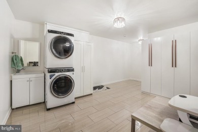 Welcome home to this beautifully renovated townhouse at 2134 on Reston National Golf Course in Virginia - for sale on GolfHomes.com, golf home, golf lot