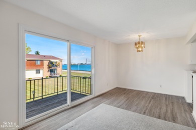 This upper-floor 2-bedroom condo offers beautiful views of the on Marysville Golf Course in Michigan - for sale on GolfHomes.com, golf home, golf lot
