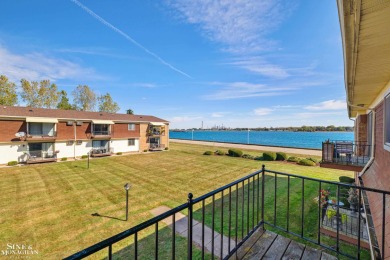 This upper-floor 2-bedroom condo offers beautiful views of the on Marysville Golf Course in Michigan - for sale on GolfHomes.com, golf home, golf lot