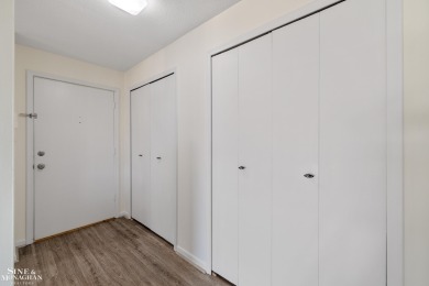 This upper-floor 2-bedroom condo offers beautiful views of the on Marysville Golf Course in Michigan - for sale on GolfHomes.com, golf home, golf lot
