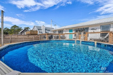 Welcome to your Orange Beach getaway where coastal charm meets on Orange Beach Golf Center in Alabama - for sale on GolfHomes.com, golf home, golf lot