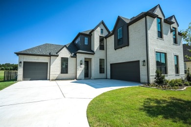 Experience luxury living in this brand-new Windmiller custom on Southern Oaks Golf Club in Texas - for sale on GolfHomes.com, golf home, golf lot