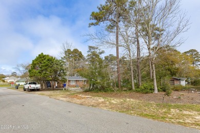 Waterway Views can be yours from this building lot right behind on Founders Club At St. James Plantation in North Carolina - for sale on GolfHomes.com, golf home, golf lot