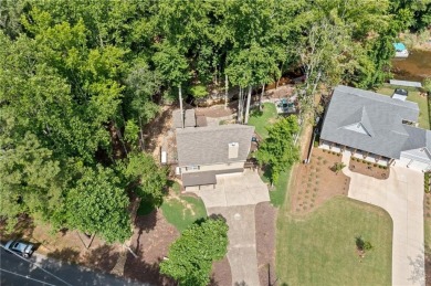 Lake Access and Private Dock! This Charming Lakeside Retreat is on The Highlands Course at Lake Arrowhead in Georgia - for sale on GolfHomes.com, golf home, golf lot