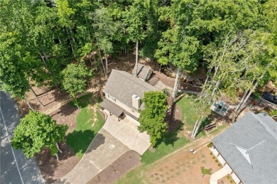 Lake Access and Private Dock! This Charming Lakeside Retreat is on The Highlands Course at Lake Arrowhead in Georgia - for sale on GolfHomes.com, golf home, golf lot