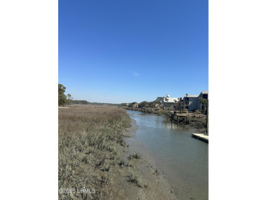 Discover the perfect canvas for your dream home with this on Ocean Creek Golf Course in South Carolina - for sale on GolfHomes.com, golf home, golf lot