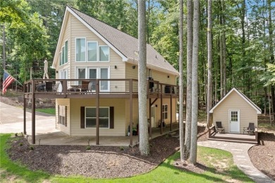 Lake Access and Private Dock! This Charming Lakeside Retreat is on The Highlands Course at Lake Arrowhead in Georgia - for sale on GolfHomes.com, golf home, golf lot