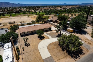 STUNNING VIEWS AWAIT YOU!

If you're searching for a home that on Hesperia Golf and Country Club in California - for sale on GolfHomes.com, golf home, golf lot